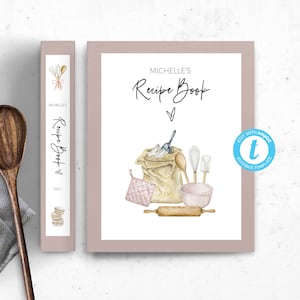May include: A printable recipe book cover template with a watercolor illustration of baking supplies, including a bag of flour, a rolling pin, a mixing bowl, and a whisk. The text "Michelle's Recipe Book" is written in black cursive font.