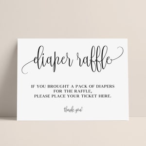 May include: A white sign with black text that reads "diaper raffle". The sign also says "If you brought a pack of diapers for the raffle, please place your ticket here. Thank you!"