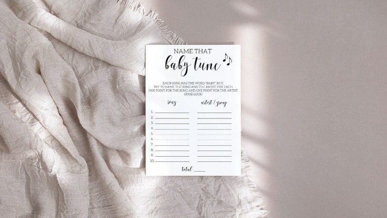 May include: A printable baby shower game called "Name That Baby Tune". The game has a list of 10 songs that all have the word "baby" in the title. Players try to name the song and the artist for each song. One point is awarded for each correct answer.