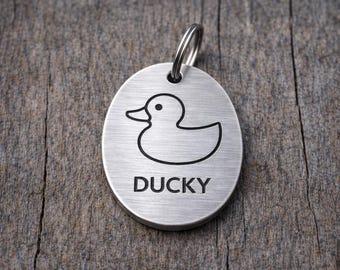 Minimal Line Duck Pet ID Tag – Personalized Silver Brushed Metal Dog Tag, Modern Ducky Design, Custom Engraved Name Collar Tag