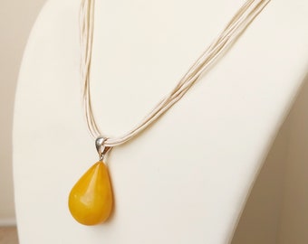 Necklace with Egg Yolk Amber Pendant