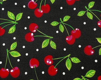 Cerises - rouge vif avec des feuilles vert vif sur fond noir avec des touches de coton blanc