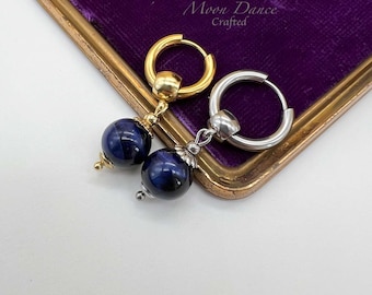 Orecchini a bottone con gemma occhio di tigre, naturale, piatto tondo, 4mm, argento 925 Orecchini a bottone con gemma occhio di tigre, naturale, piatto tondo, 4mm, argento 925