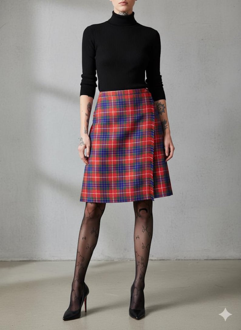 May include: A red, blue, and white plaid skirt with a wrap design. The skirt is paired with a black turtleneck and patterned tights. The outfit is completed with black high heels.