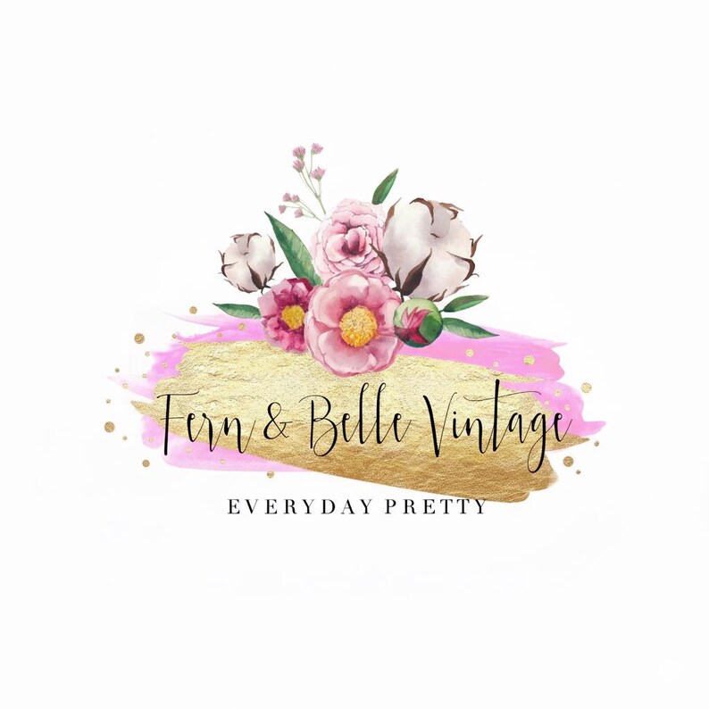 May include: A logo featuring a floral arrangement of pink flowers, cotton bolls, and green leaves atop a gold and pink brushstroke. The text "Fern & Belle Vintage" is written in elegant script, with "EVERYDAY PRETTY" below.