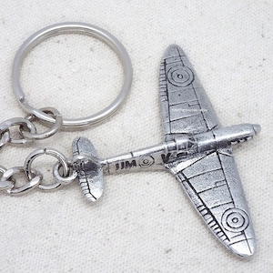 Spitfire Fighter WW2 Aircraft Aeroplane Round Keyring in a Grey Burlap Pouch
