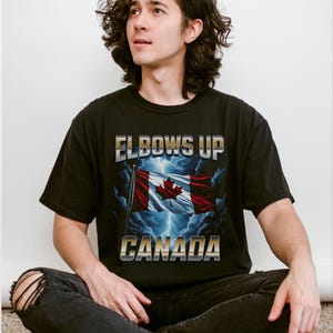 Elbows Up Canada Shirt: Patriotic Bootleg Rap Style - Unisex Cotton Tee (M0318D25)