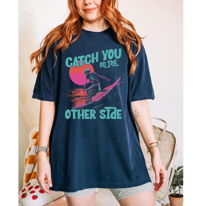 a t - shirt with the words, your new favorite comfy tee