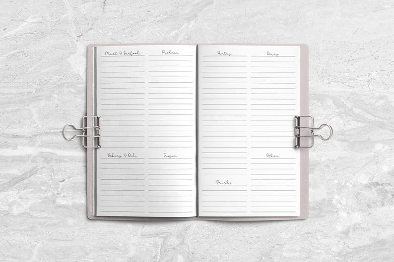 a notebook with a ring binder on top of it