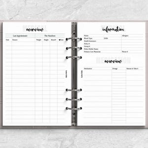 a planner with a pen on top of it