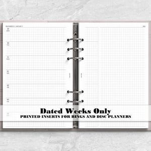 May include: A light gray ring-bound planner featuring white grid-lined paper inserts with dated weekly layouts. The planner includes a silver metal pen held in a side loop. Text on the image reads: Dated Weeks Only, PRINTED INSERTS FOR RINGS AND DISC PLANNERS.