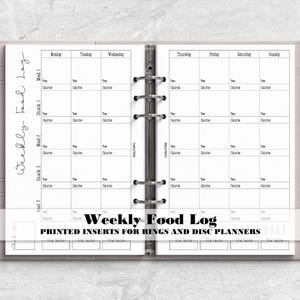a planner with the words weekly food log printed on it