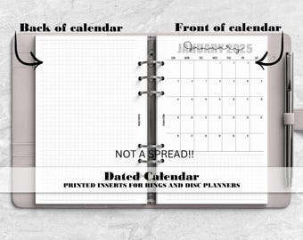 May include: A ring-bound planner featuring a dated January 2025 calendar insert on the right and a grid-lined page on the left. The text reads Back of calendar, Front of calendar, NOT A SPREAD!!, Dated Calendar, and PRINTED INSERTS FOR RINGS AND DISC PLANNERS.