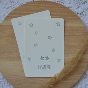Postkarte mit Sternen für Sternenkinder Zwillinge