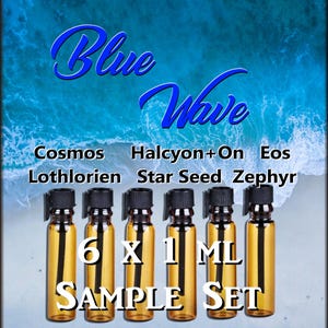 May include: A set of six 1 ml amber glass vials with black caps, labeled with the names Cosmos, Halcyon+On, Eos, Lothlorien, Star Seed, and Zephyr. The text Blue Wave and 6 X 1 ML SAMPLE SET is displayed over an ocean wave background.