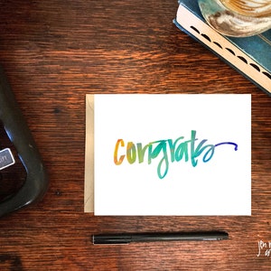 Congratulazioni! biglietto di auguri; lettering a mano; carta vuota con busta