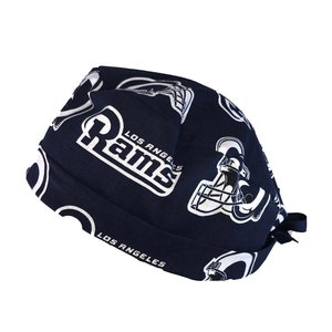 May include: A navy blue surgical scrub hat with a white Los Angeles Rams logo and helmet pattern.