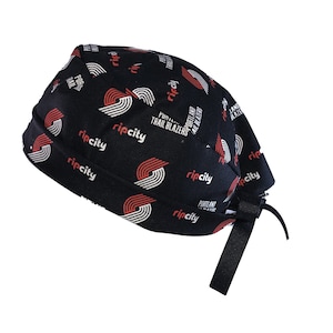 May include: Black bandana with a red and white Portland Trail Blazers logo and the text "Rip City" repeated throughout.