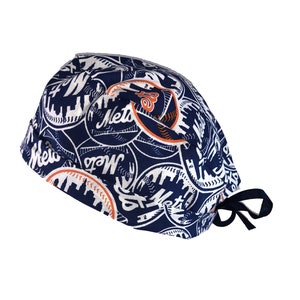 May include: A navy blue surgical scrub cap with a repeating pattern of white city skylines, baseballs, and the word "Mets" in white and orange. The cap has a black tie closure.