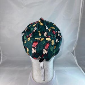 a hat with a mickey mouse pattern on it