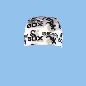 May include: White bandana with black and gray print of the Chicago White Sox logo and the words "Chicago White Sox".
