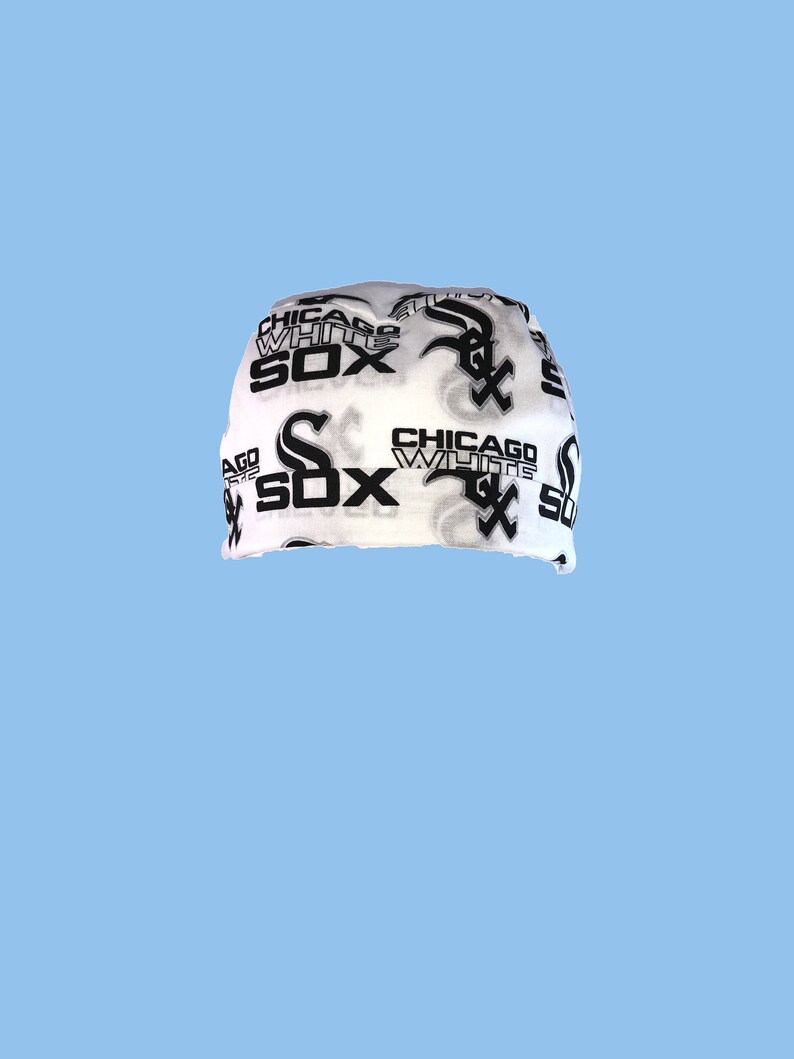 May include: White bandana with black and gray print of the Chicago White Sox logo and the words "Chicago White Sox".