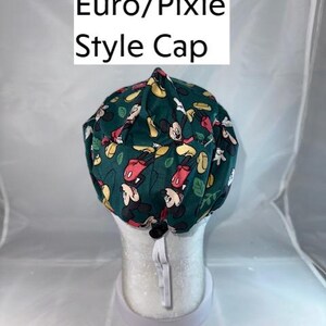 a hat with a mickey mouse pattern on it