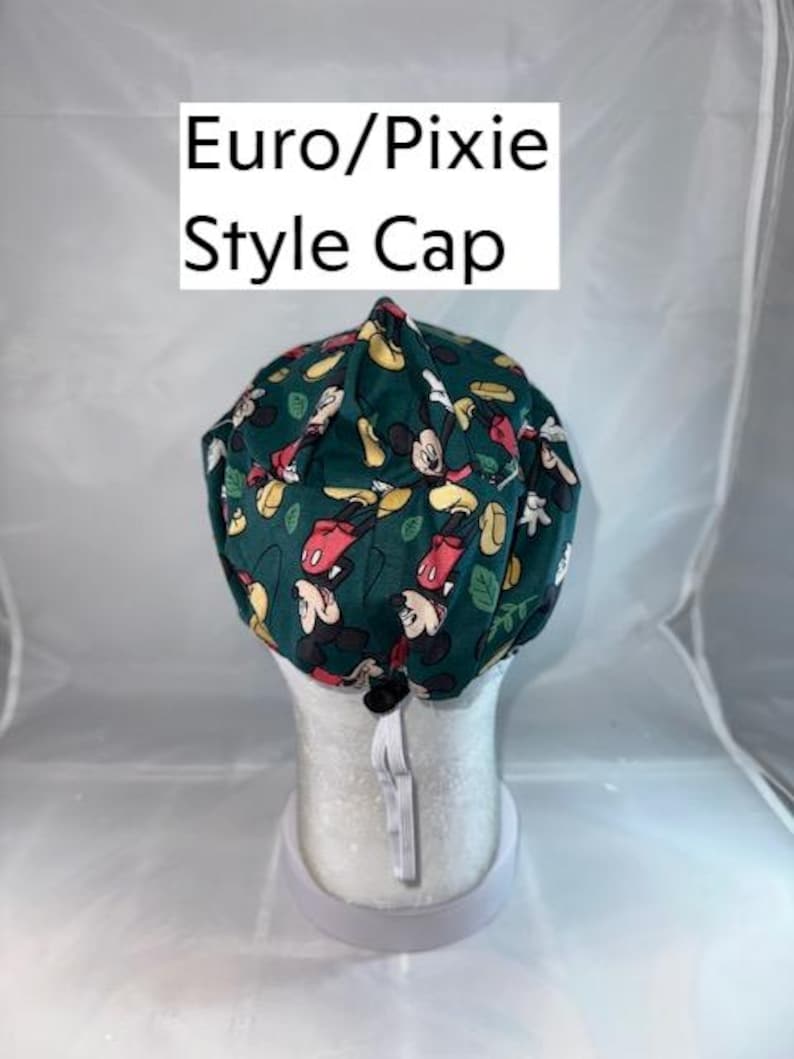 a hat with a mickey mouse pattern on it