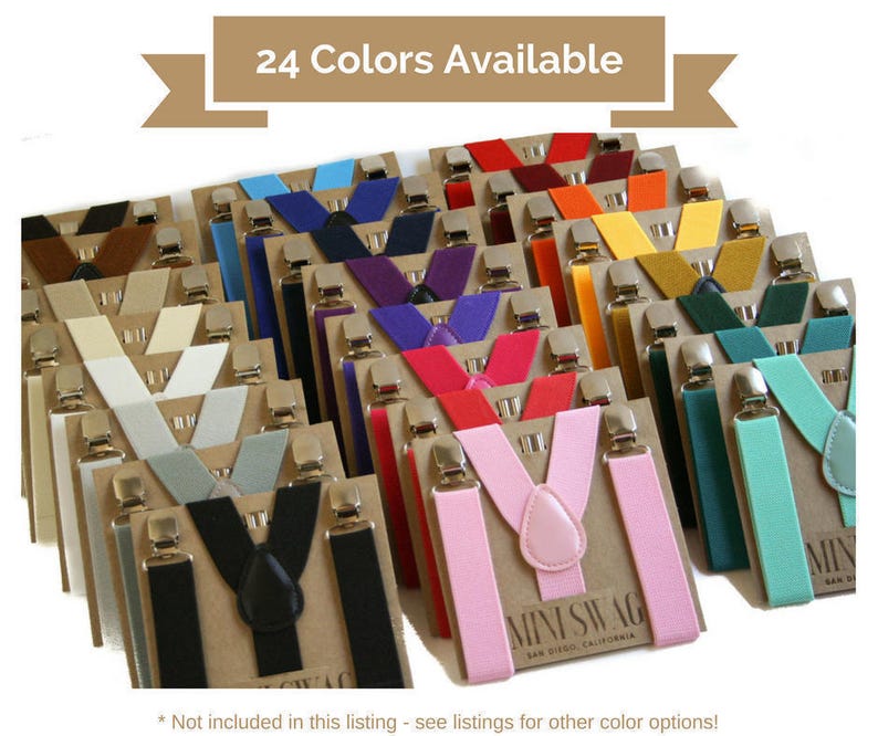 May include: A display of clip-on suspenders in various colors, including black, pink, and blue. Each pair is attached to a cardboard backing with silver-toned clips. The text "24 Colors Available" is at the top.