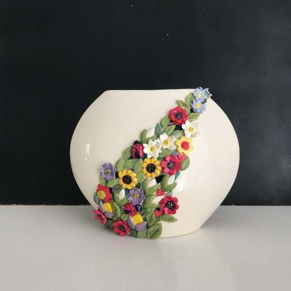 Handmade glazed ceramic vase Wild flowers.Ellipse.Floral motifs. Mosaic art. Tabletop Decoration