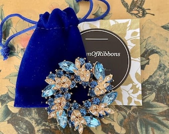 Vintage Inspired Blue Crystal Brooch: Gold Tone Floral Pin