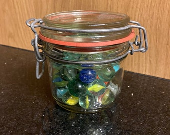 50 Marbles in a Clip Jar, vintage marbles all colours and sizes.