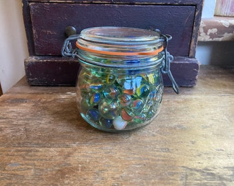 120 Marbles in a Clip Jar, vintage marbles all colours and sizes.