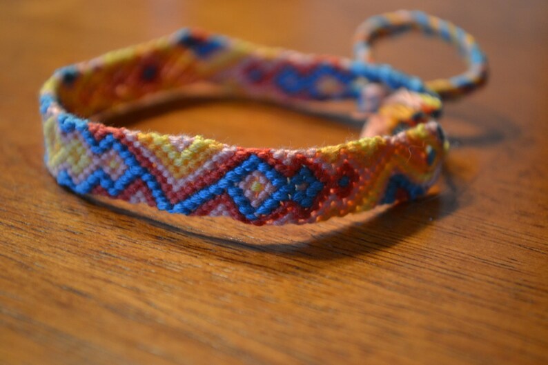 salmon Yellow orange bright blue diamond and triangle pattern handmade woven friendship bracelet