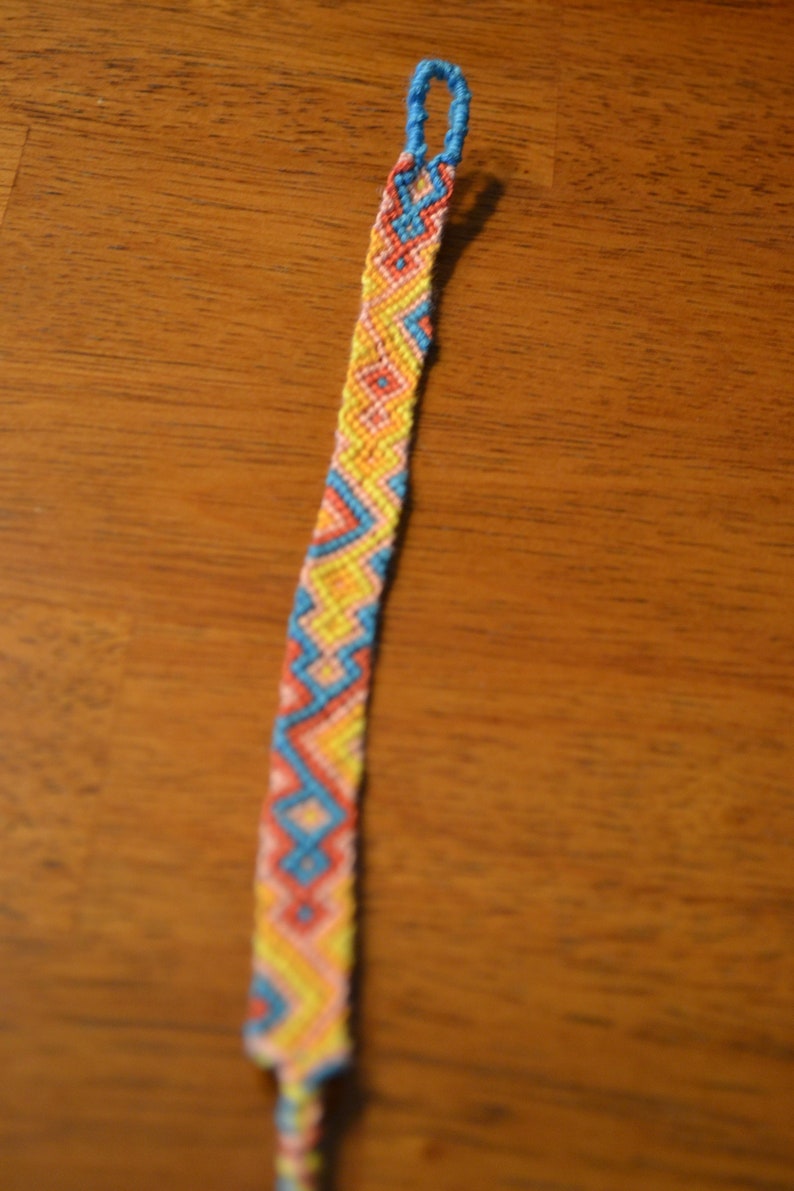 salmon Yellow orange bright blue diamond and triangle pattern handmade woven friendship bracelet
