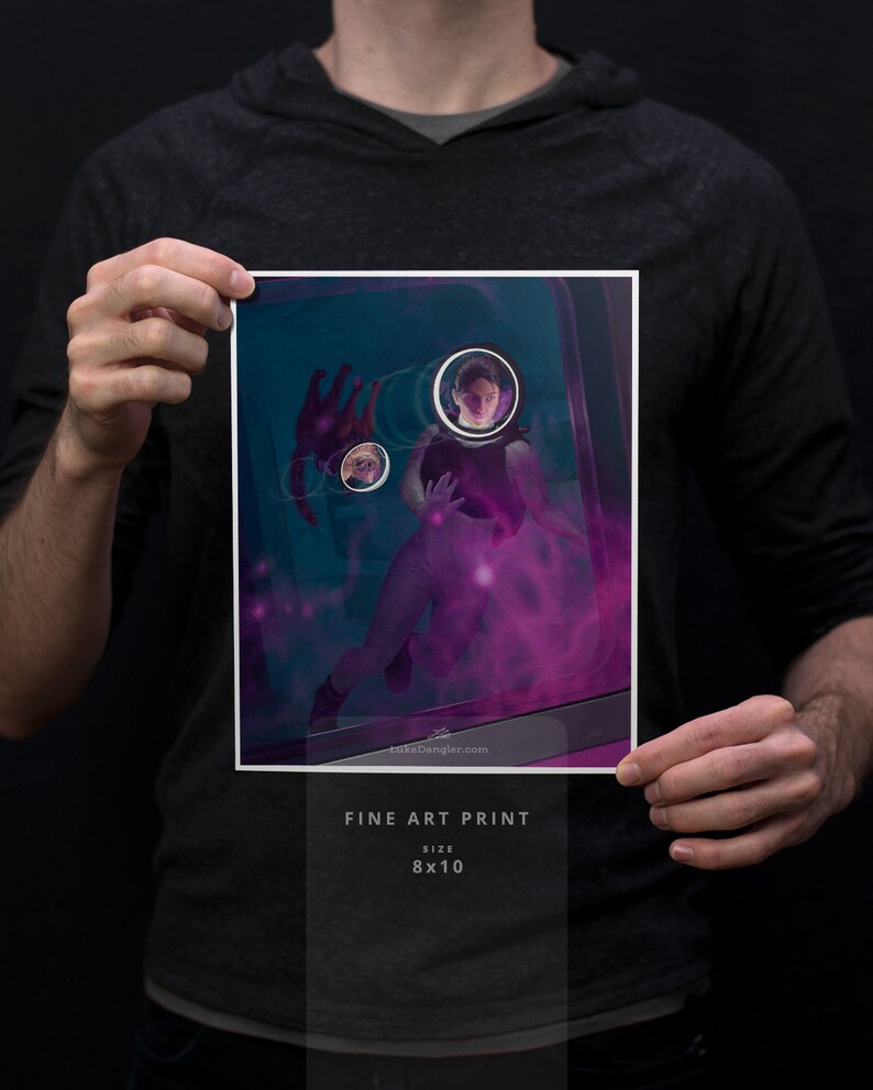 May include: A fine art print of a woman in a purple and blue nebula with a glowing orb around her head. The print is 8x10 inches.