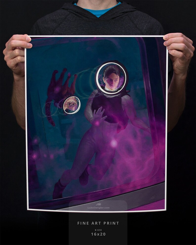 May include: A woman in a white jumpsuit and black vest is floating in a purple and blue nebula. She is surrounded by glowing orbs and a small creature is visible in the background. The image is a fine art print, 16x20 inches.
