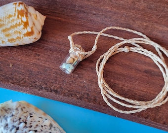 Macrame necklace with glass vials and sea shells