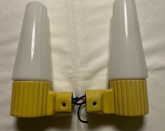 Pair of Sigvard Bernadotte Ifø bathroomlamps. 1960s in a rare yellow colour.