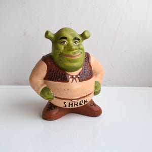 Boneco Shrek de cerâmica vintage de 18 cm, cofrinho quebrável em formato de porquinho. Quebre para abrir o pote de moedas. Arte retrô para decoração de casa. Brinquedo pintado à mão.
