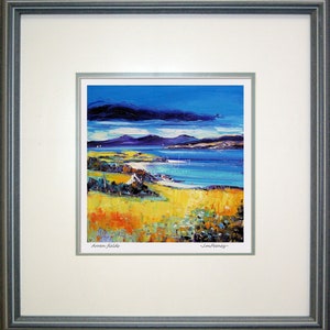 May include: A framed print of a painting depicting a seascape with a blue sky, white clouds, and a body of water. The painting is signed "Jim Fereney" and "Arran, Relais".