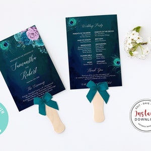 May include: Wedding fan set with peacock feather and floral design. The fans feature the names "Samantha and Robert" and wedding details. Each fan has a teal bow and wooden handle.