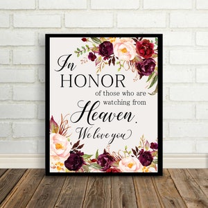 May include: A printable sign with a floral wreath design in shades of burgundy, pink, and gold. The text reads "In honor of those who are watching from Heaven. We love you."