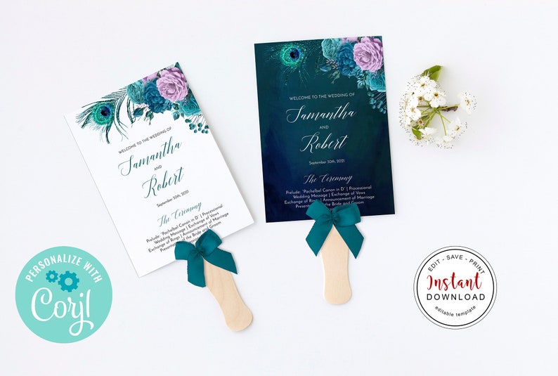 May include: Wedding fan with a peacock feather design and teal and purple floral accents. The fan displays the names "Samantha and Robert" and the wedding date. A teal ribbon is attached to the wooden handle.