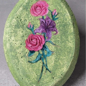Biodegradable Mandorla Urn with Flower. For land or water burial