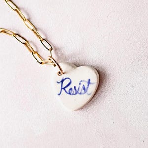 Handmade Ceramic Resist Necklace | Feminist Empowerment Jewelry