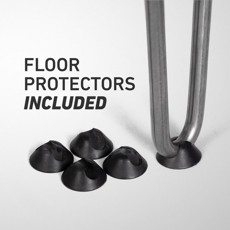 May include: Close-up of a metal hairpin leg with four black floor protectors. The text "FLOOR PROTECTORS INCLUDED" is printed in black, emphasizing the product's features. The protectors are designed to safeguard floors.