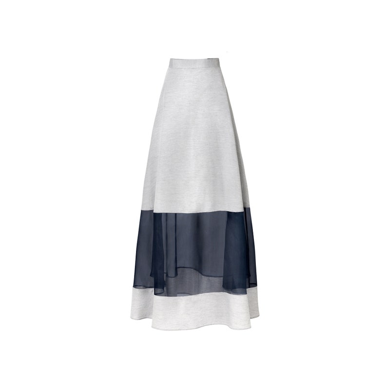 May include: A long gray skirt with a black sheer overlay. The skirt is a-line and has a simple design.
