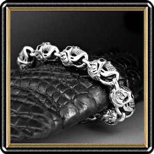 Sterling Silver Flamed Skull Biker Bracelet: Rosary Style