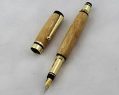 Gold and black Classic Elite Pen with Rubberwood